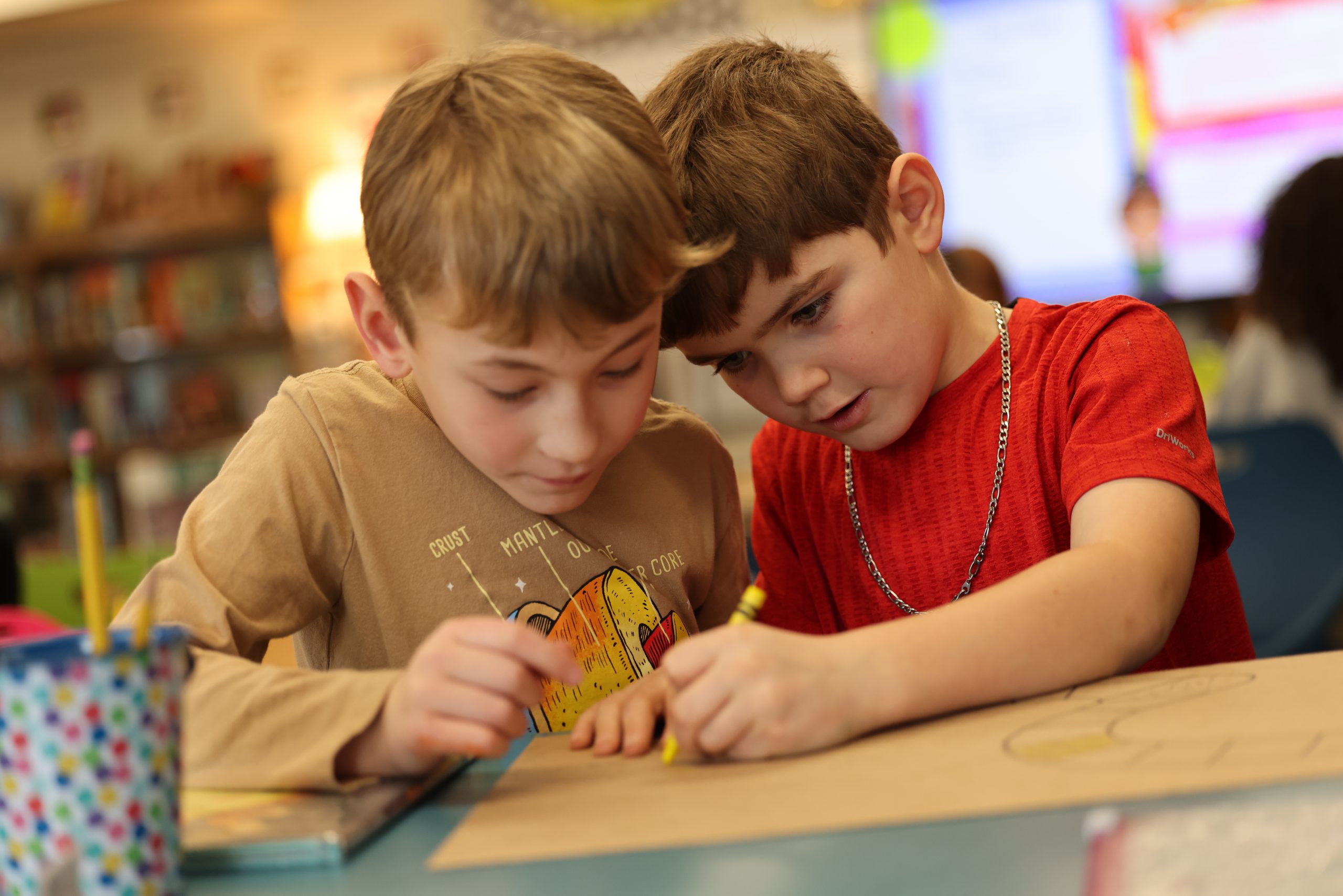 two students coloring