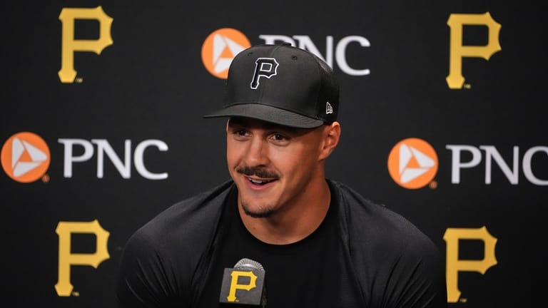 Pittsburgh Pirates' Konnor Griffin meets with reporters before making his...