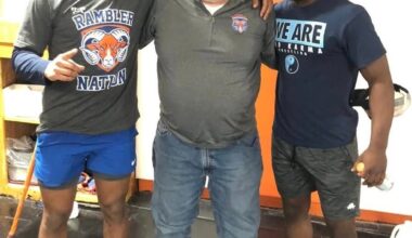 Floyd “Skip” Chatt (center) is pictured with former Cathedral Prep wrestlers Carter Starocci (left) and Paniro Johnson (right) in the Prep wrestling room. Starocci and Johnson both enjoyed NCAA Division I success after starting their careers under Chatt.