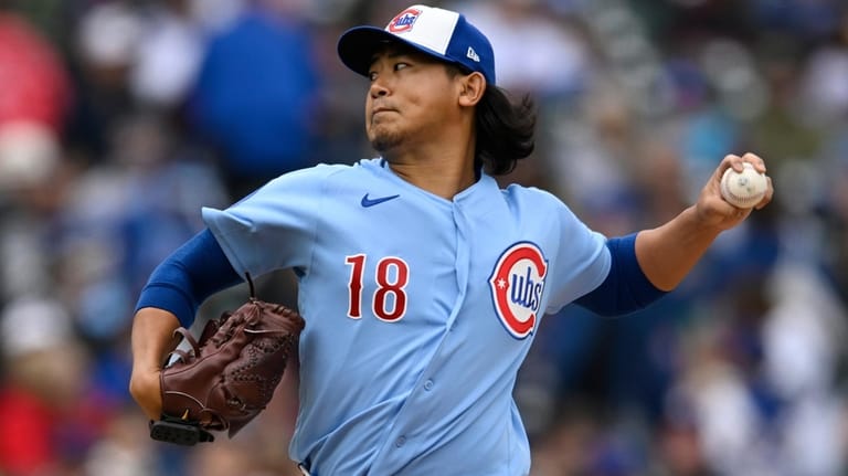 Chicago Cubs starter Shota Imanaga delivers a pitch during the...