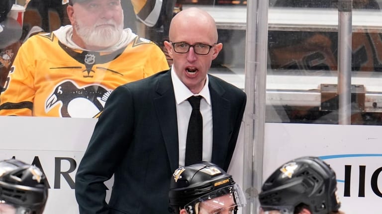 Pittsburgh Penguins head coach Dan Muse directs his team during...