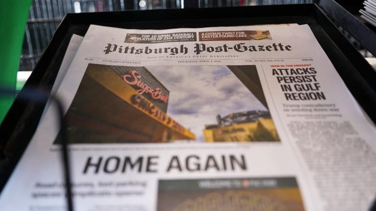 The printed edition of the Pittsburgh Post-Gazette sits in a...