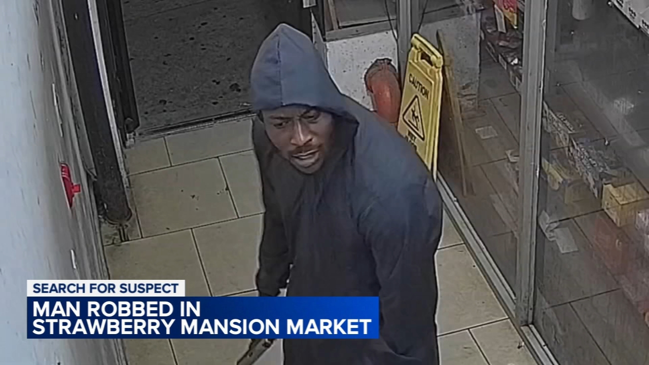 Police have released surveillance video of an assault and robbery at a market in Philadelphia's Strawberry Mansion section.