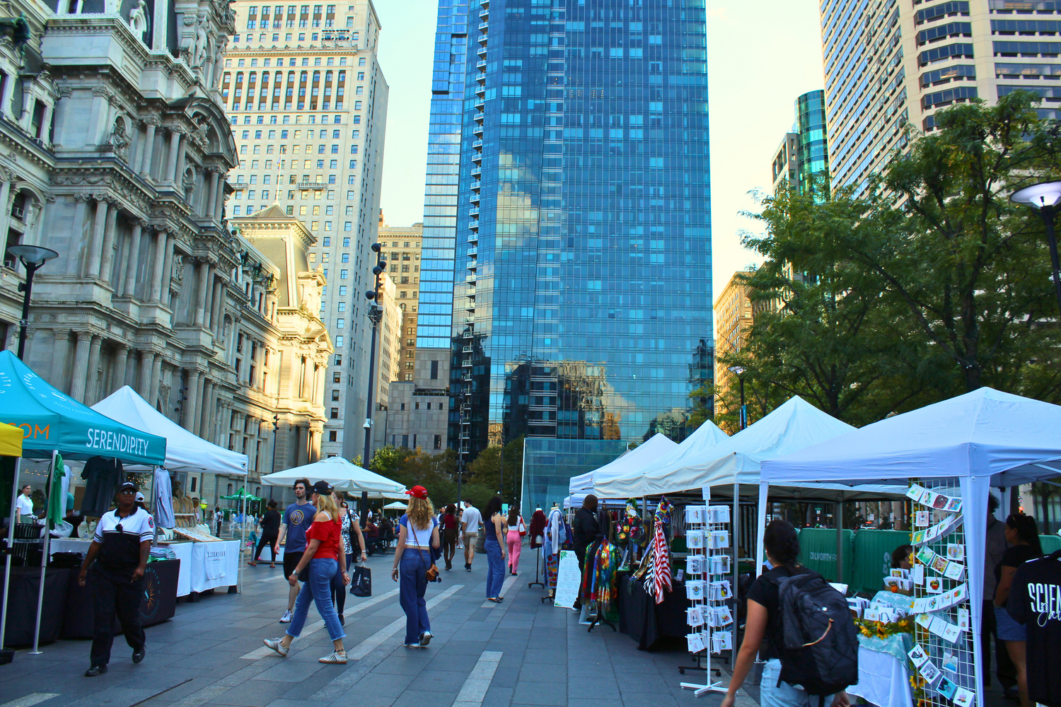 Locals browse as vendors sell handmade goods, artwork and specialty foods at Dilworth Park during the Made in Philadelphia Spring Market in Center City.