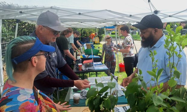 Upper Darby Mayor Ed Brown at one of vendor booths at Earth Day Community Celebration. (COURTESY OF CHRISTEN COOPER)