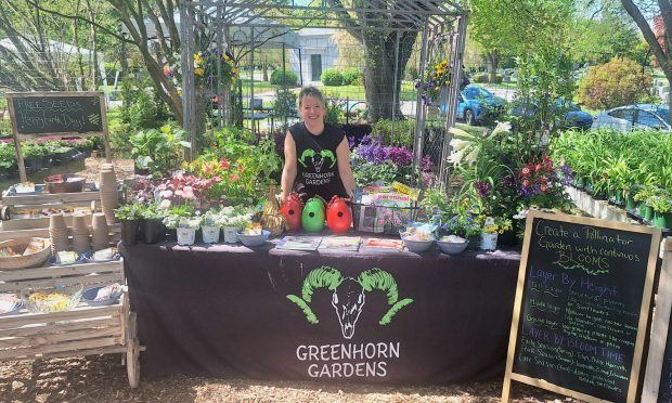 Stacey Sullivan-McNichol at the GreenHorn Gardens table and display. (COURTESY OF CHRISTEN COOPER)