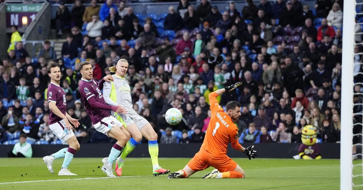 Man City climb to Premier League summit after victory relegates Burnley