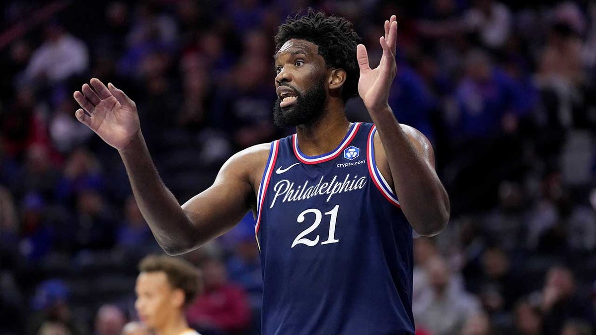 Joel Embiid reacting during a basketball game at Xfinity Mobile Arena in Philadelphia
