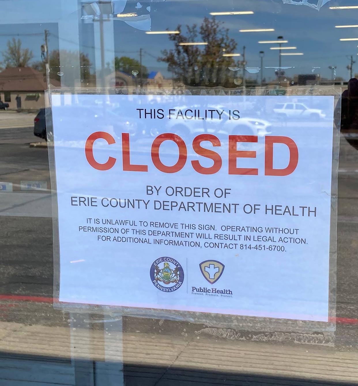 A sign posted on the front doors of Save A Lot, 2209 W. 12th St., states that the Erie County Department of Health ordered the Millcreek Township grocery store to close. Other handmade signs indicated the store closed permanently April 26.