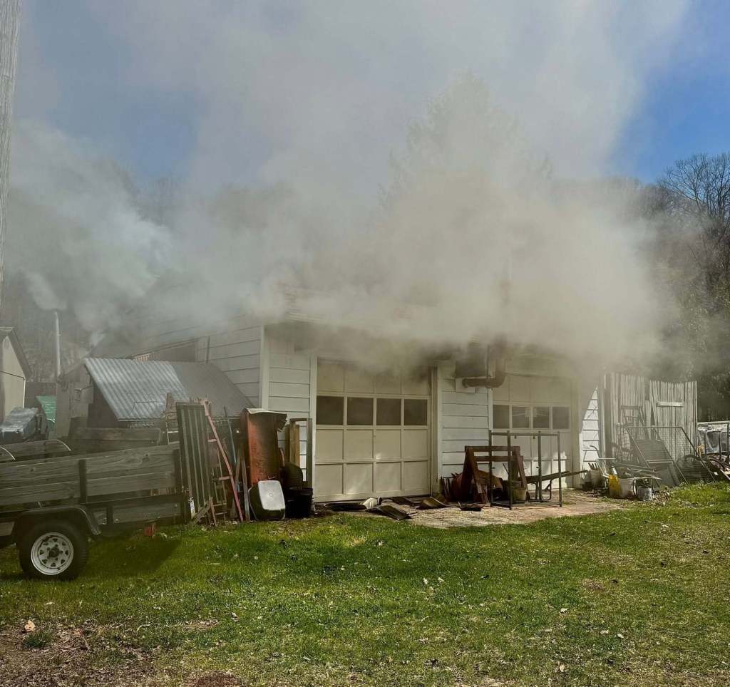 Passerby helps crews get a jump on garage fire near Alsace Manor