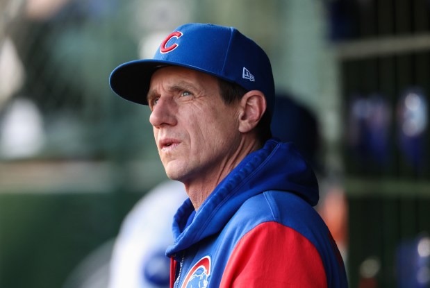 Cubs manager Craig Counsell stands in the dugout before a game against the Phillies at Wrigley Field on April 22, 2026, in Chicago. (John J. Kim/Chicago Tribune)