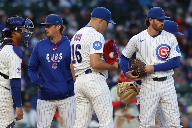 Cubs starting pitcher Matthew Boyd, center, finishes with a meeting on the mound in the second inning against the Phillies at Wrigley Field on April 22, 2026, in Chicago. (John J. Kim/Chicago Tribune)