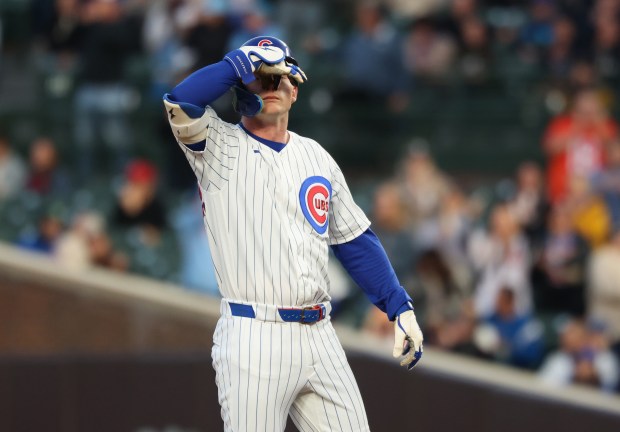 Cubs center fielder Pete Crow-Armstrong gestures to teammates after hitting an RBI double in the second inning against the Phillies at Wrigley Field on April 22, 2026, in Chicago. (John J. Kim/Chicago Tribune)