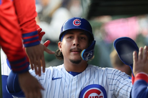 Cubs catcher Miguel Amaya celebrates after scoring on an RBI double from center fielder Pete Crow-Armstrong in the second inning against the Phillies at Wrigley Field on April 22, 2026, in Chicago. (John J. Kim/Chicago Tribune)