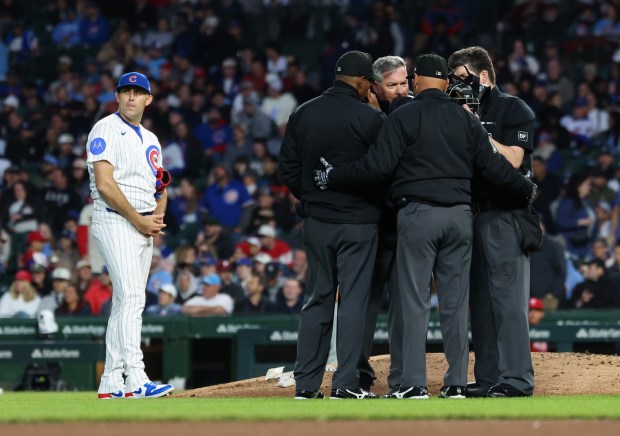 Cubs starting pitcher Matthew Boyd waits for officials to finish a discussion in the fourth inning against the Phillies at Wrigley Field on April 22, 2026, in Chicago. A ball hit by Phillies right fielder Adolis García was initially called a home run but overturned after video review. (John J. Kim/Chicago Tribune)