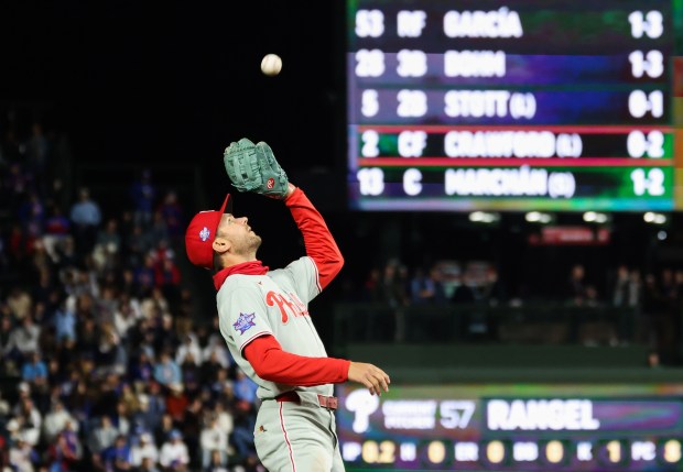 Phillies shortstop Trea Turner catches a pop up from Cubs third baseman Alex Bregman in the sixth inning at Wrigley Field on April 22, 2026, in Chicago. (John J. Kim/Chicago Tribune)