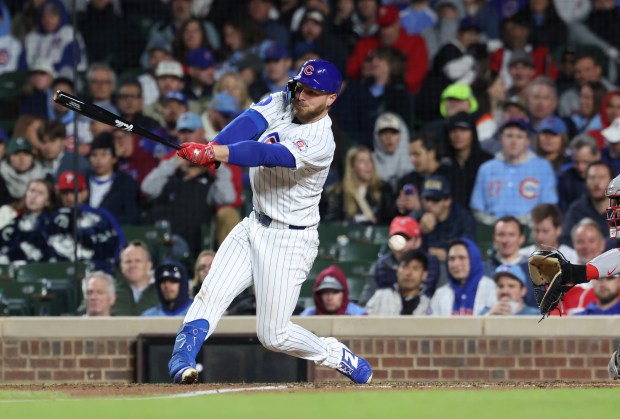 Cubs first baseman Michael Busch strikes out swinging in the seventh inning against the Phillies at Wrigley Field on April 22, 2026, in Chicago. (John J. Kim/Chicago Tribune)