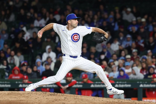 Cubs pitcher Corbin Martin throws against the Phillies in the eighth inning at Wrigley Field on April 22, 2026, in Chicago. (John J. Kim/Chicago Tribune)