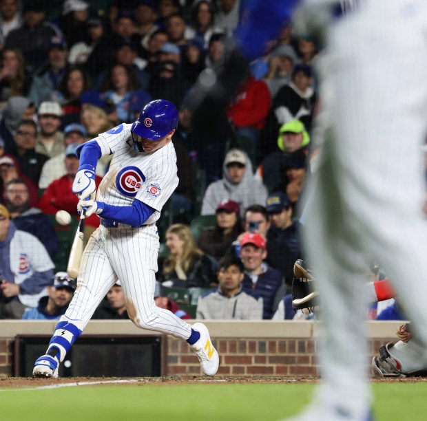 Cubs center fielder Pete Crow-Armstrong connects for an RBI single against the Phillies in the eighth inning at Wrigley Field on April 22, 2026, in Chicago. (John J. Kim/Chicago Tribune)