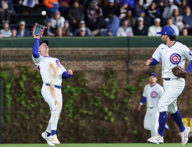 Cubs center fielder Pete Crow-Armstrong catches a fly ball from Phillies third baseman Alec Bohm for an out in the ninth inning at Wrigley Field on April 22, 2026, in Chicago. (John J. Kim/Chicago Tribune)