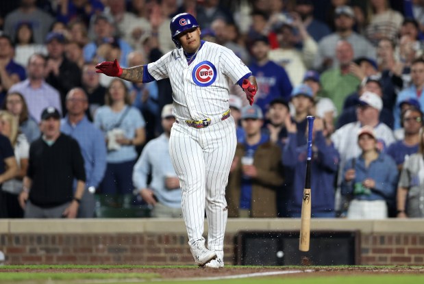Chicago Cubs pinch hitter Moisés Ballesteros (25) celebrates after drawing a run-scoring walk in the fifth inning of a game against the Philadelphia Phillies at Wrigley Field in Chicago on April 21, 2026. (Chris Sweda/Chicago Tribune)