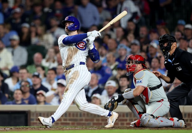 Chicago Cubs second baseman Nico Hoerner (2) hits a solo home run in the seventh inning of a game against the Philadelphia Phillies at Wrigley Field in Chicago on April 21, 2026. (Chris Sweda/Chicago Tribune)