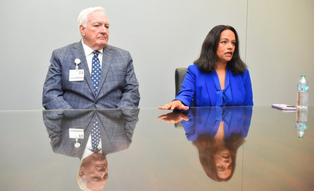 Tenor Health Foundation CEO Radha Savitala speaks during an interview in a conference room in Wilkes-Barre General Hospital in Wilkes-Barre Monday, April 27, 2026, as Commonwealth Health CEO Michael Clark looks on. (SEAN MCKEAG / STAFF PHOTOGRAPHER)