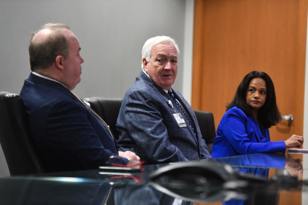 From left, Commonwealth Health Vice President of Clinical Services Dr. Patrick Conaboy, Commonwealth Health CEO Michael Clark and Tenor Health Foundation CEO Radha Savitala speak during an interview in a conference room in Wilkes-Barre General Hospital in Wilkes-Barre Monday, April 27, 2026. (SEAN MCKEAG / STAFF PHOTOGRAPHER)
