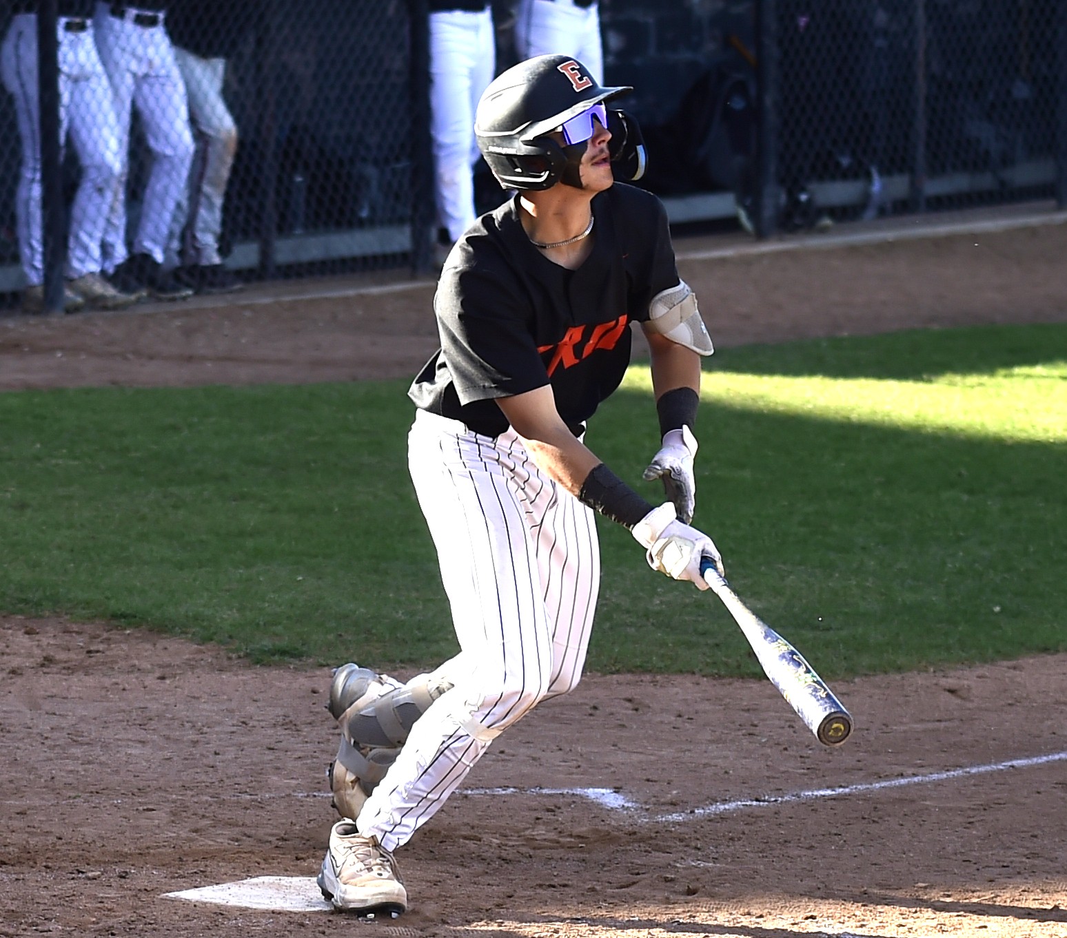 Erie's Evan Dillinger watches his deep drive against Fairview on...