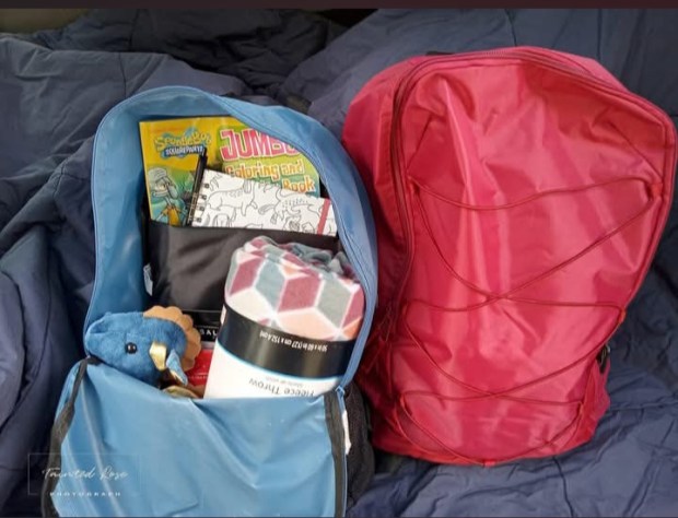 Items inside the comfort bags include coloring books, blankets and a stuffed animal. (COURTESY OF ERIKA KRAUTHEIM)