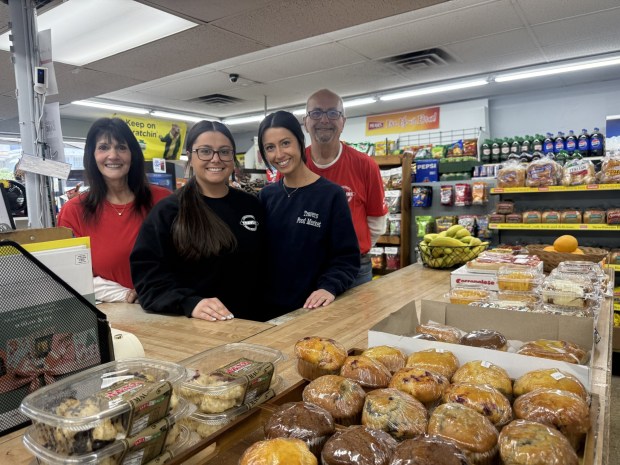 It's all in the family at Travers Food Market in Lansdowne. Donna and David Travers with daughters Brianna, left, and Christina in the black shirts. Christina is the head chef at Travers and Brianna helps with the store's marketing and advertising, and other tasks. (PEG DEGRASSA/ DAILY TIMES)