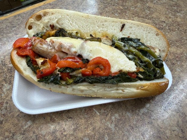 Among the hot sandwiches on Travers Food Market's menu is The Chicken Italiano, made with homemade Chicken Cutlet, Broccoli Rabe, Roasted Red Peppers and Sharp Provolone. (PEG DEGRASSA/ DAILY TIMES)