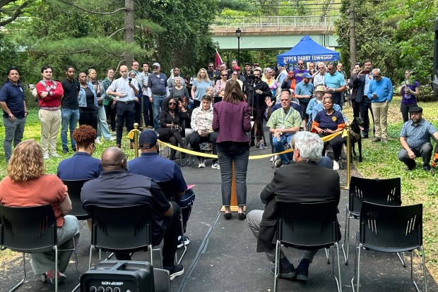 The ribbon cutting Friday for the new section of Naylor's Run Trail connecting Garrett and Marshall roads. (PETE BANNAN-DAILY TIMES)