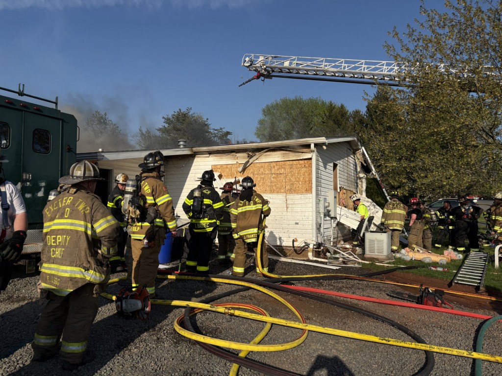 Firefighters rescue victim from 2-alarm house fire in Exeter