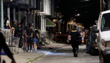 Police investigate a mass shooting on the 1500 block of Etting Street on July 7, 2025.