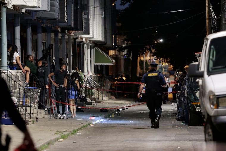 Police investigate a mass shooting on the 1500 block of Etting Street on July 7, 2025.