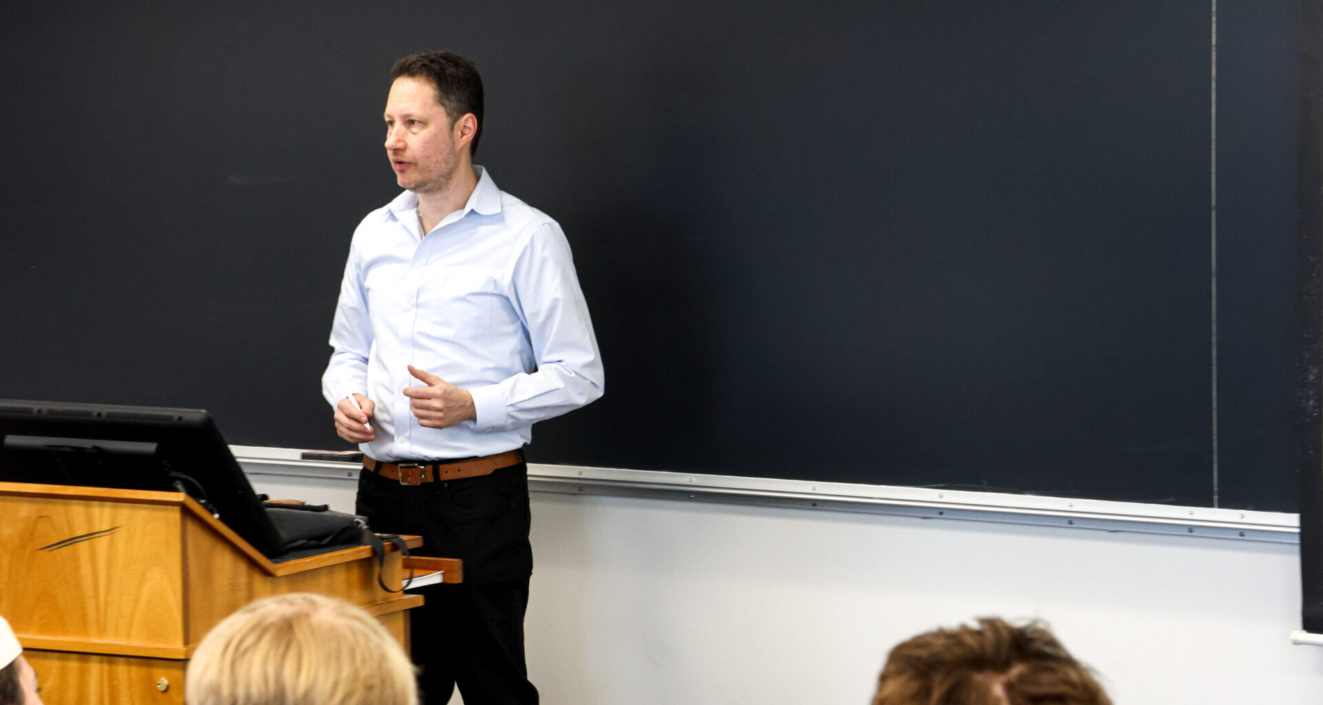 ‘Accidentally’ an economics professor, Yuval Erez brings magnetic energy to the classroom