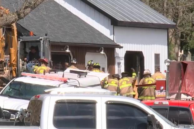 This photo made from video from WNEP shows first responders at the scene of an explosion and fire in Lamar Township near Mill Hall, Pa., Sunday, April 19, 2026. (WNEP via AP)