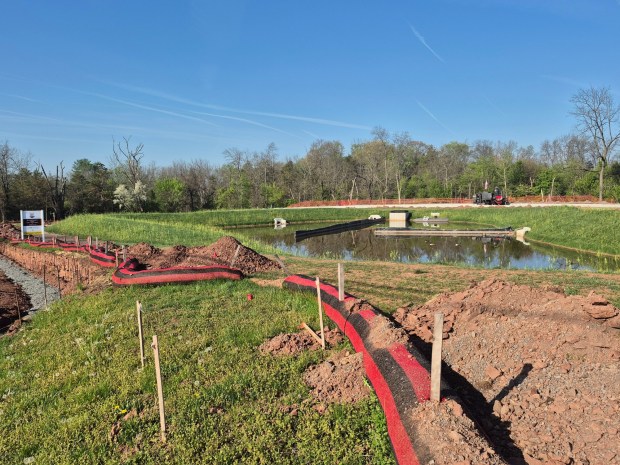 A new 55+ development is underway in Amity Township, Berks County. Highland Place is being built off Amity Park Road, and when fully complete will include 330 homes. This photo shows the site - which is in the midst of site work - including utilities, drainage, curbs and roads for the first phase of development. Sales are expected to begin late in the spring. (DONNA ROVINS - MEDIANEWS GROUP PHOTO)