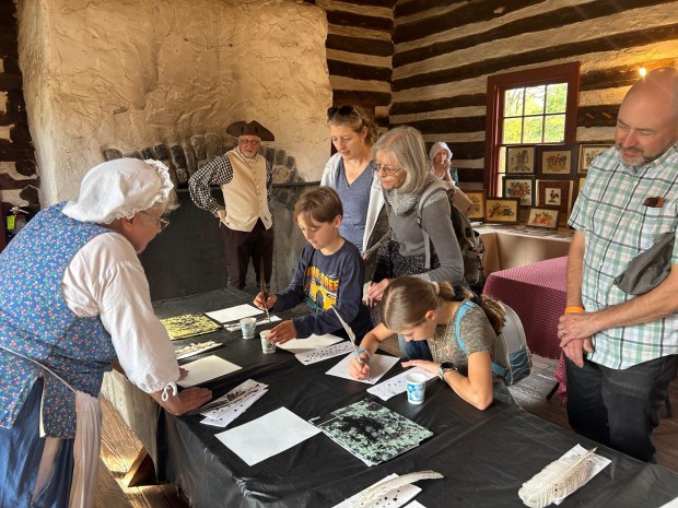 Volunteers will teach children how to write with a quill pen and dip candles as they learn about handwriting, schooling, and lighting in the 18th century during A Revolutionary Children's Day held at Daniel Boone Homestead in Exeter Township May 3. (Photo courtesy of Daniel Boone Homestead Associates)