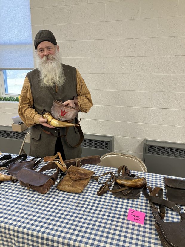 Bryan Nye, dressed in traditional costume, brought samples of his leather-made items during the 14th annual Zammelaaf at the Zion UMC Church of Iona, Lebanon, March 21. (Photo courtesy of Mary Laub, Maxatawny Township)