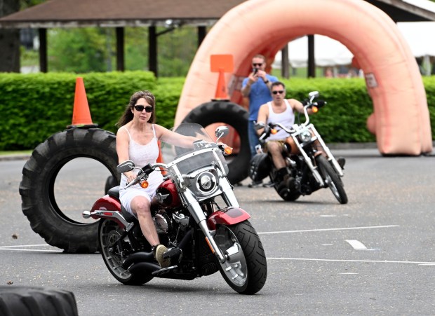 Renata and Georg Zumberge of Bernville take a spin through the obstacle course during the fourth annual Undy Run on Saturday, May 3, 2025, at Classic Harley Davidson in Bern Township. (BILL UHRICH/READING EAGLE)