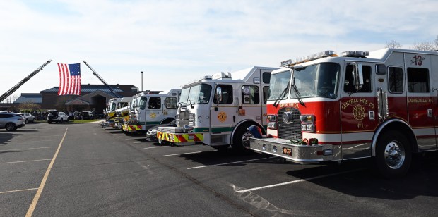 Apparatus from local and regional fire companies are parked outside Fleetwood High School prior to the viewing Friday, April 10, 2026, for Walnuttown Fire Chief Jeffory L. Buck and Assistant Chief Robert R. Shick Jr. (BILL UHRICH/READING EAGLE). (BILL UHRICH/READING EAGLE)