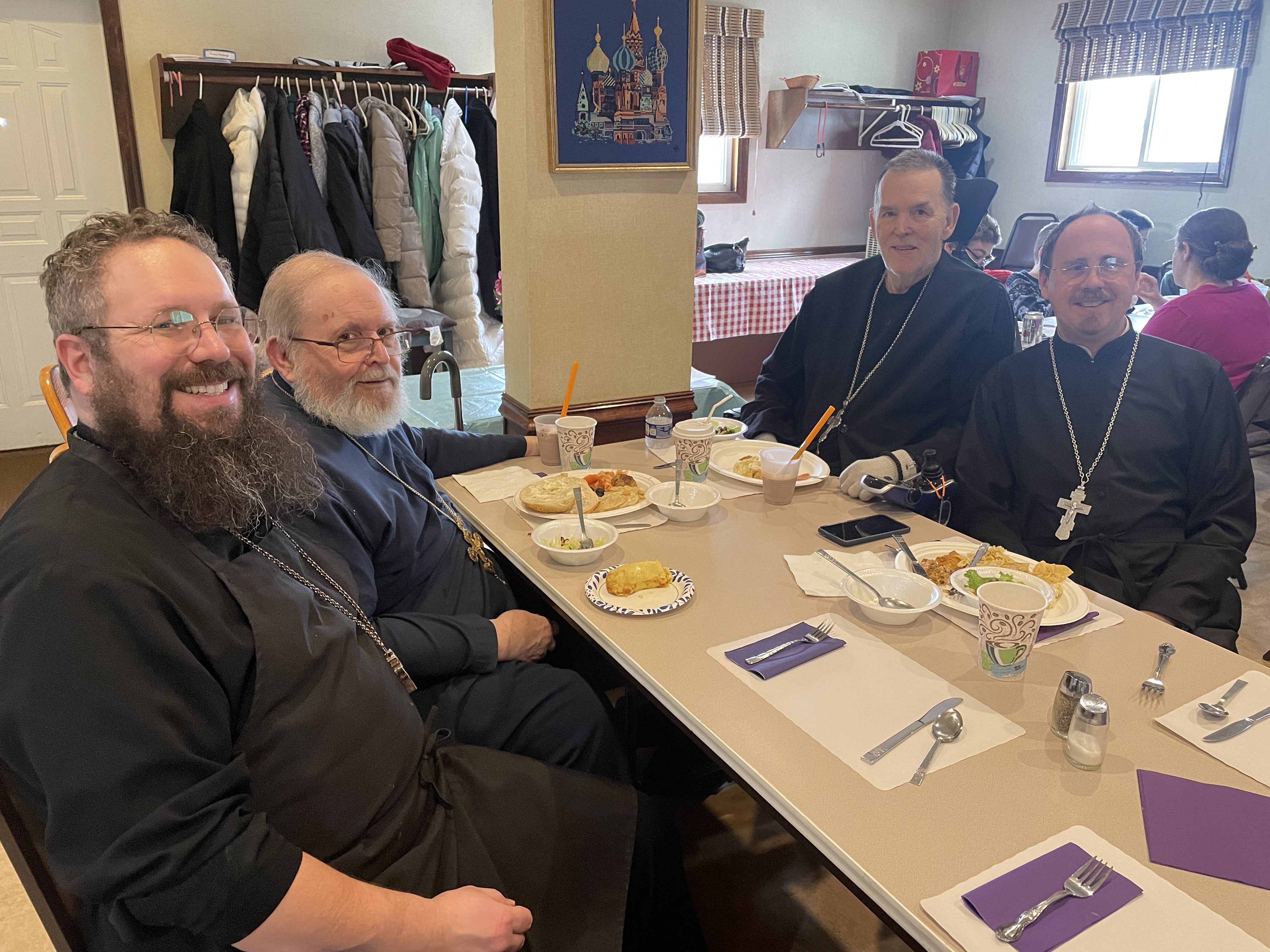 Local Orthodox priests gather at St. Nicholas Orthodox Church hall....