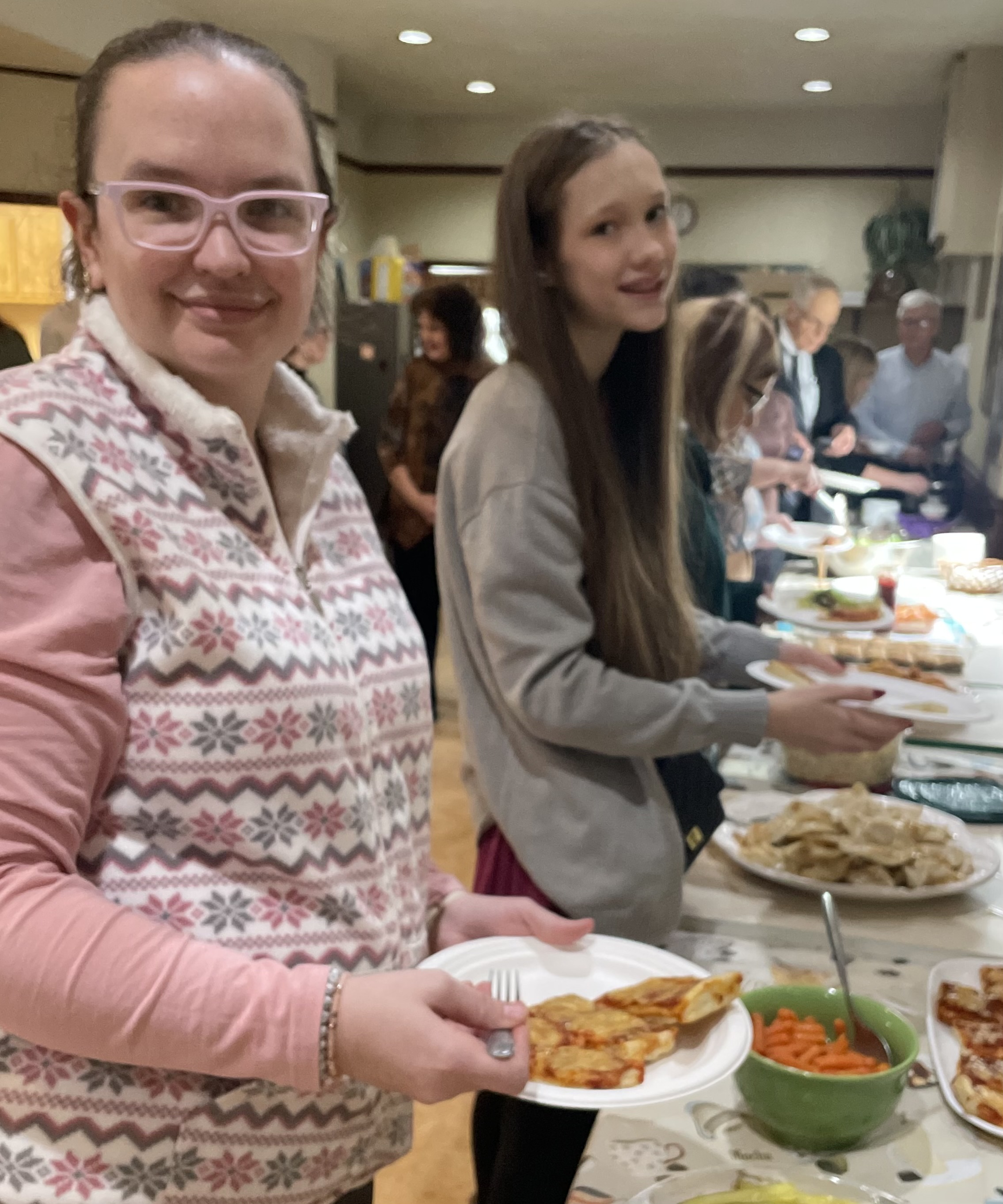 Beki Donovan and Anna Witek select their favorite food from...