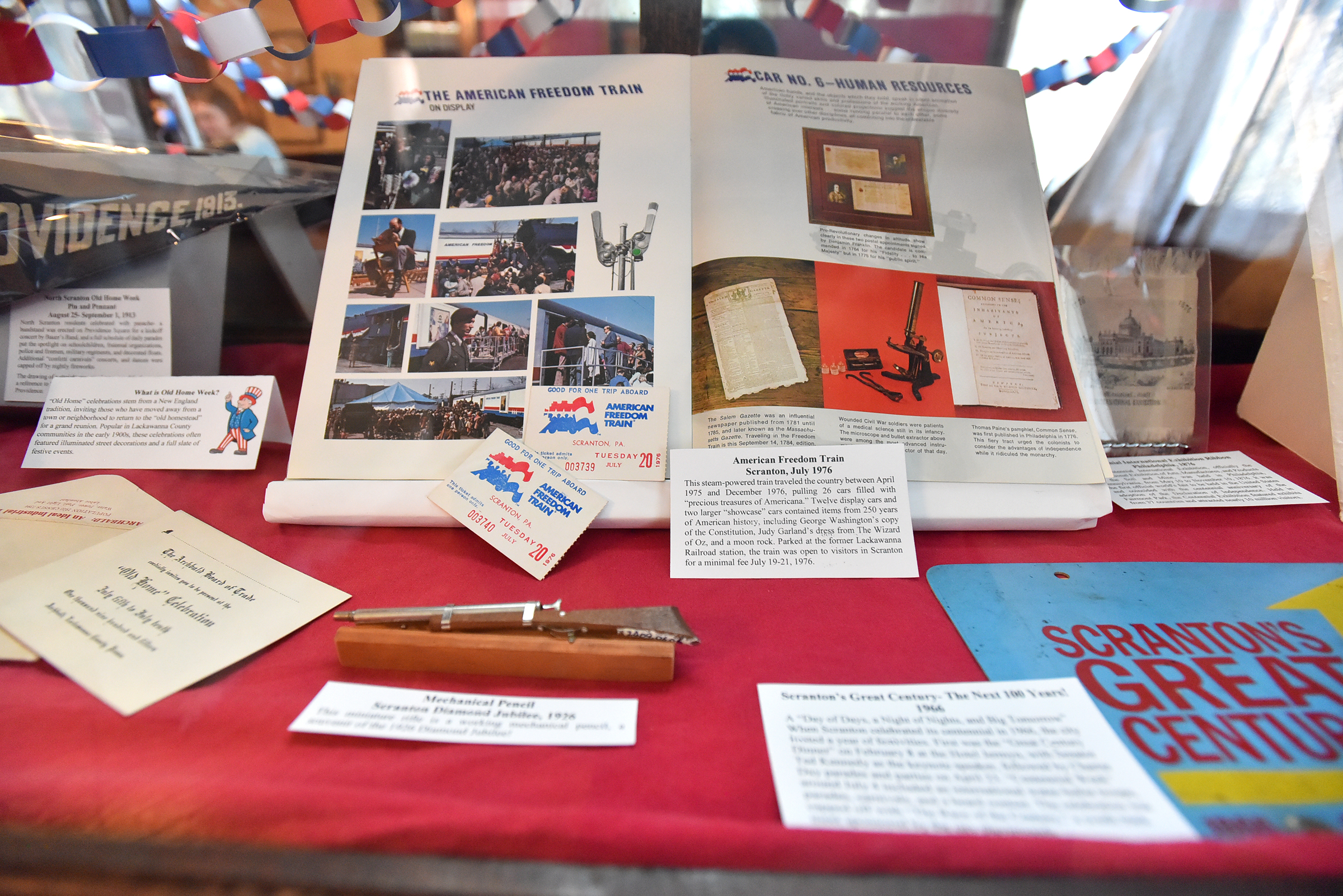 Items that celebrate local history are presented in a display...