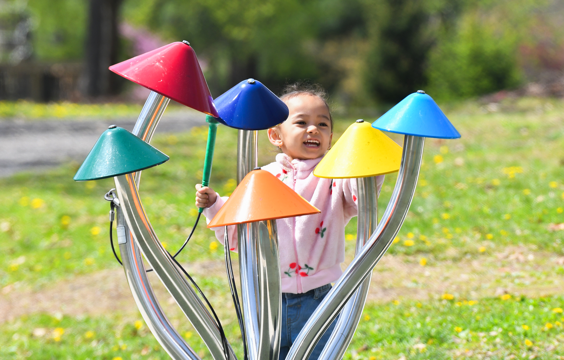 Eliana Pariyar, 4, of Cincinnati, Oh., plays in the Butterfly...