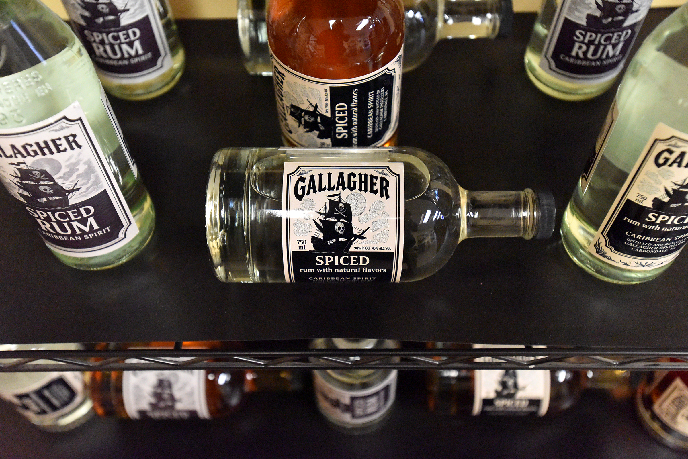 Bottles of rum are for sale in Gallagher Distillery in...