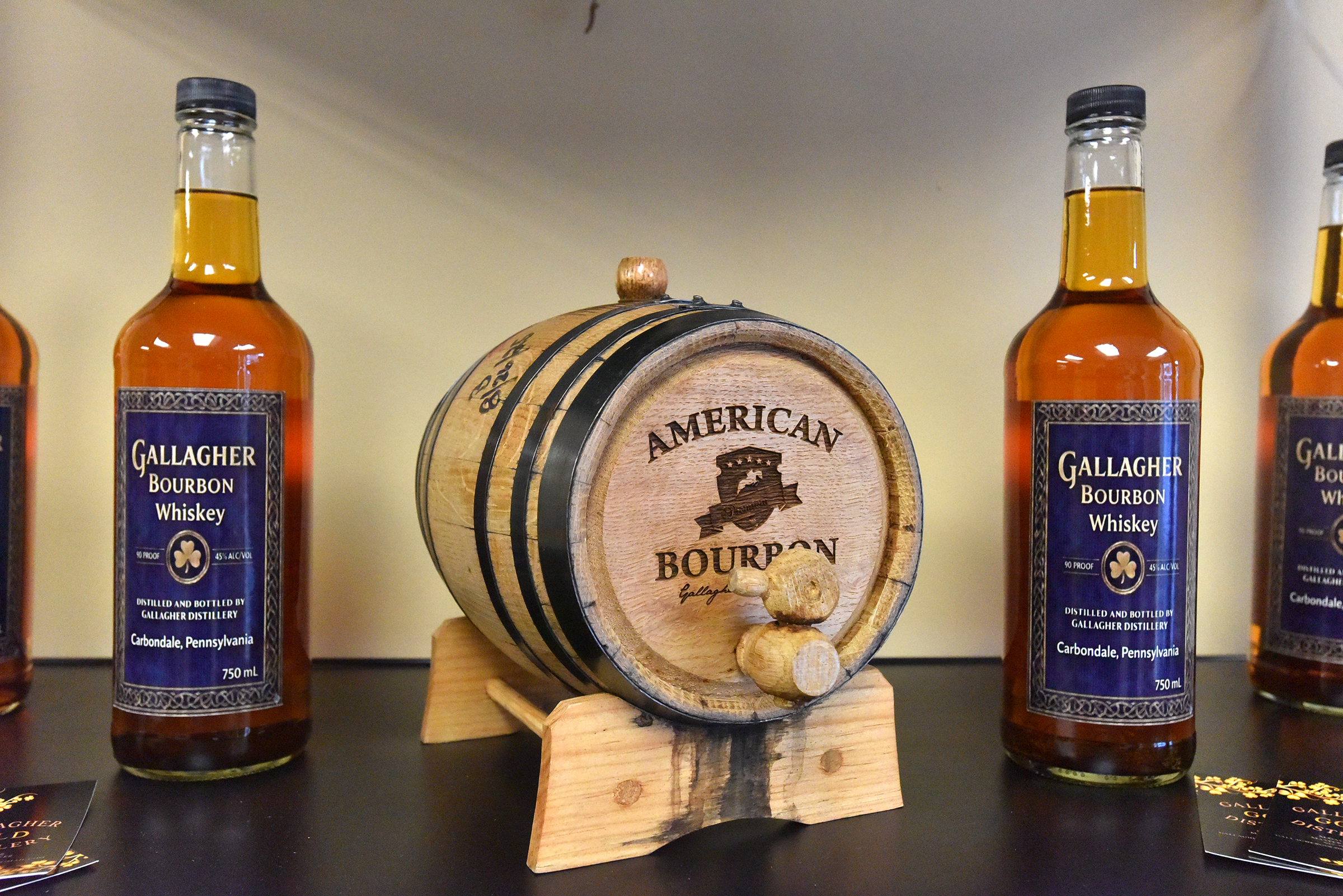Bottles of bourbon whiskey are for sale in Gallagher Distillery...