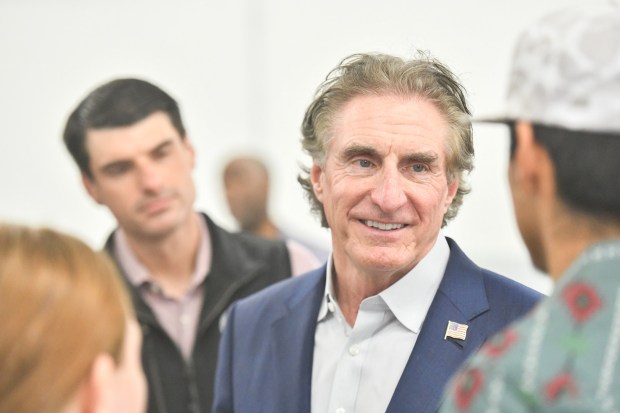 U.S. Secretary of the Interior Doug Burgum talks with Lackawanna College students in the ABB Robotics training facility in Scranton. Joining Burgum are U.S. Rep. Dan Meuser and U.S. Rep. Rob Bresnahan.